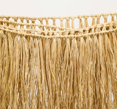 Decoratieve slinger van natuurlijke raffia franjes